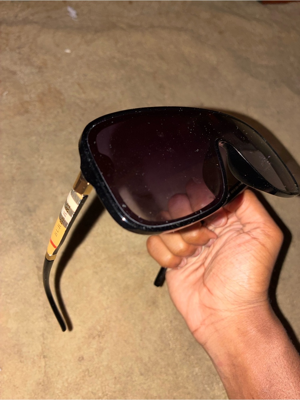 Burberry Black Shield Sunglasses with Check-Pattern Gold Temples